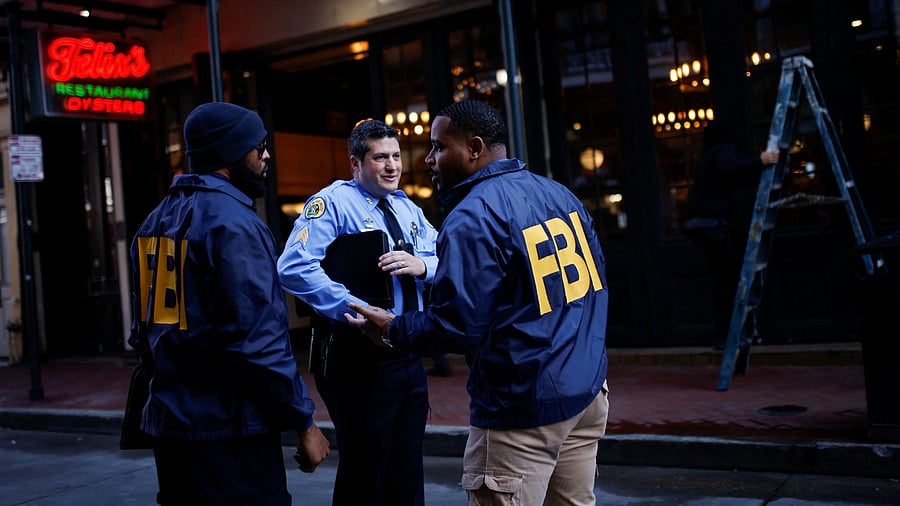 <div class="paragraphs"><p>FBI agents stand, after people were killed by a man driving a truck in an attack during New Year's celebrations, in New Orleans, Louisiana, U.S., January 2, 2025. </p></div>