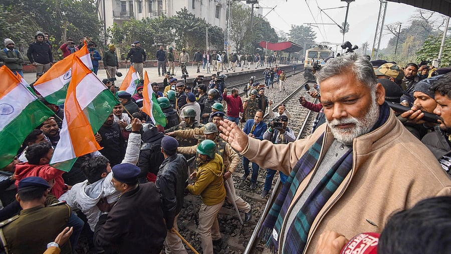 <div class="paragraphs"><p>Pappu Yadav joins the protest of students blocking railway tracks demanding the cancellation of the 70th Integrated CCE, 2024, conducted by the BPSC, over allegations of question paper leak, at Sachiwalay Halt railway station, in Patna, Friday, Jan. 3, 2025.</p></div>