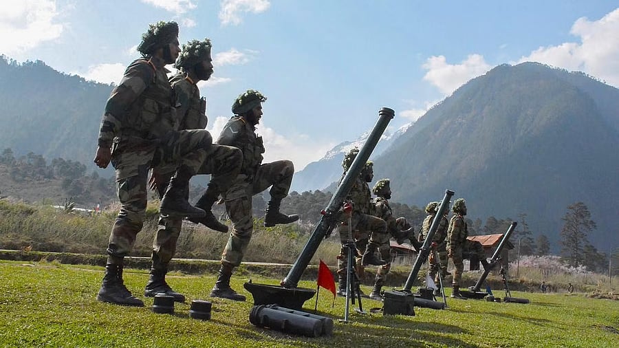<div class="paragraphs"><p>A file photo shows the Indian army personnel carring out drills close to the Line of Actual Control (LAC)</p></div>