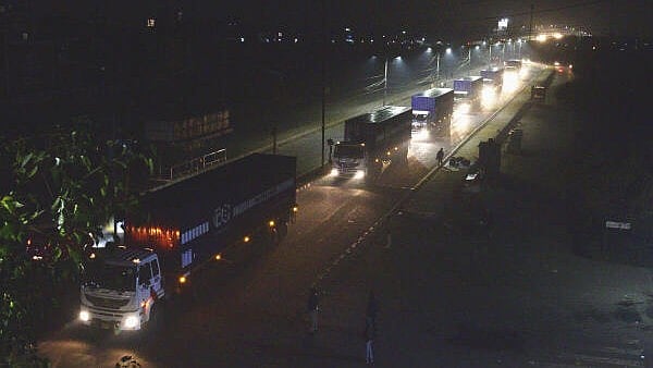 <div class="paragraphs"><p>Container trucks carry toxic waste after collecting from the Union Carbide factory for disposal at the Pithampur Industrial Waste Management Facility.</p></div>