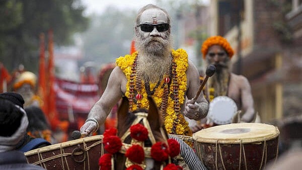 <div class="paragraphs"><p>Sadhus of the Shree Mahanirvani Akhada take part in the 'Chavni Pravesh', or royal entry procession ahead of the Mahakumbh, at Sangam in Prayagraj, Thursday.&nbsp;</p></div>