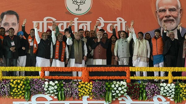 <div class="paragraphs"><p>Prime Minister Narendra Modi with Union Minister Manohar Lal, Union Minister of State Harsh Malhotra, Delhi BJP President Virendra Sachdeva, BJP MP Manoj Tiwari, party candidate for Delhi Assembly elections Kailash Gahlot and other leaders during a public meeting, in New Delhi.&nbsp;</p></div>