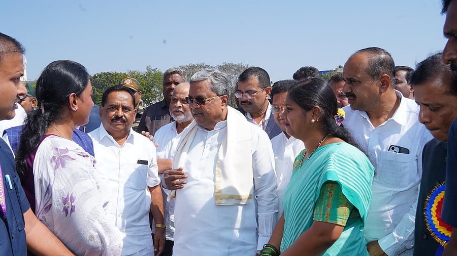 <div class="paragraphs"><p>Karnataka Chief Minister Siddaramaiah interacting with people after inaugurating stalls at the MBA College ground in Davangere on Sunday during the state level youth festival.</p></div>