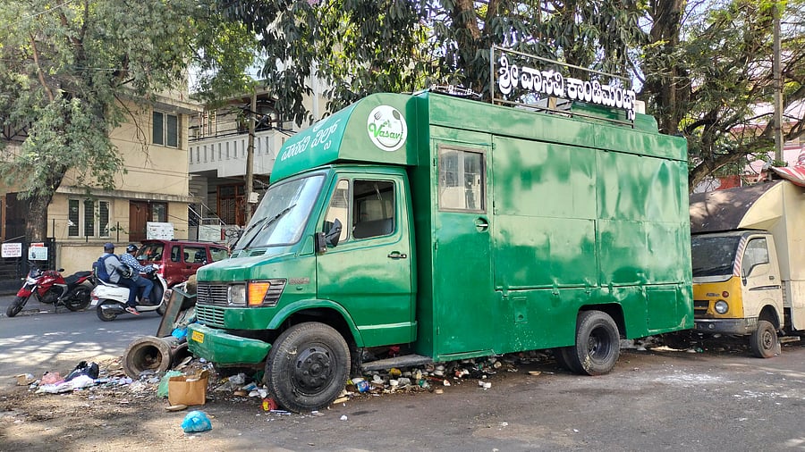 <div class="paragraphs"><p>Garbage under a food truck.  </p></div>