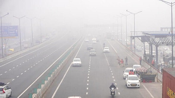 <div class="paragraphs"><p>Vehicles move on NH 24 amid fog, in New Delhi.</p></div>