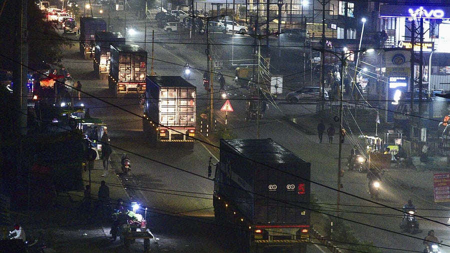 <div class="paragraphs"><p>Container trucks carry toxic waste after collecting from the Union Carbide factory for disposal at the Pithampur Industrial Waste Management Facility. </p></div>