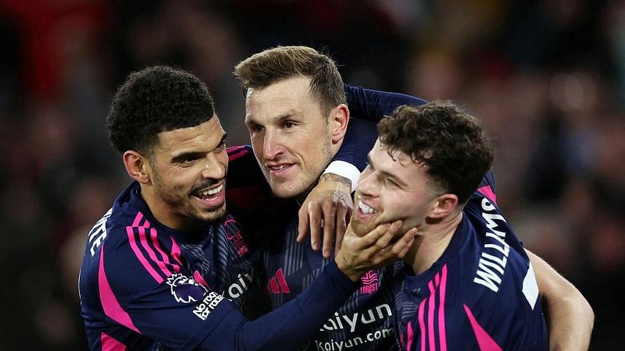 <div class="paragraphs"><p>Nottingham Forest's Chris Wood celebrates scoring their second goal with Nottingham Forest's Morgan Gibbs-White and Nottingham Forest's Neco Williams.</p></div>