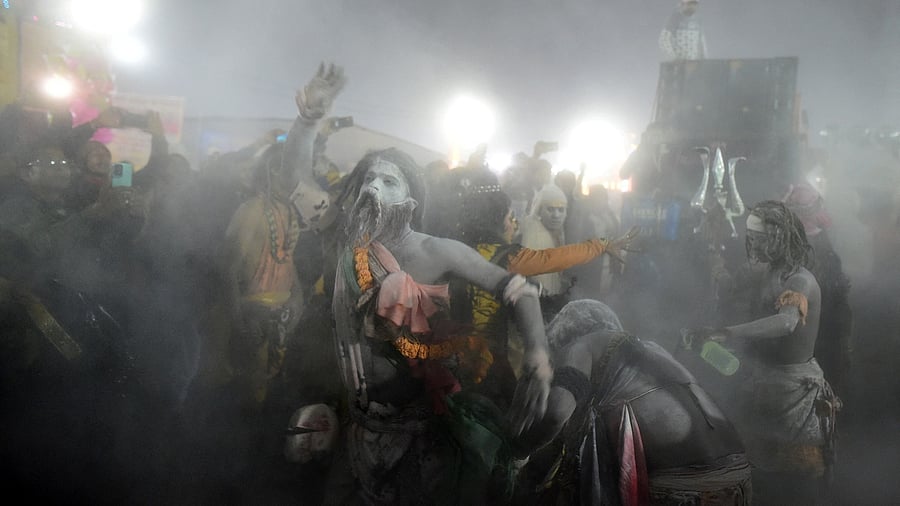 <div class="paragraphs"><p>Sadhus dance as they take part in a religious procession during "Peshwai" or the arrival of the members of an akhara or sect of sadhus for the upcoming "Maha Kumbh Mela" in Prayagraj.</p></div>