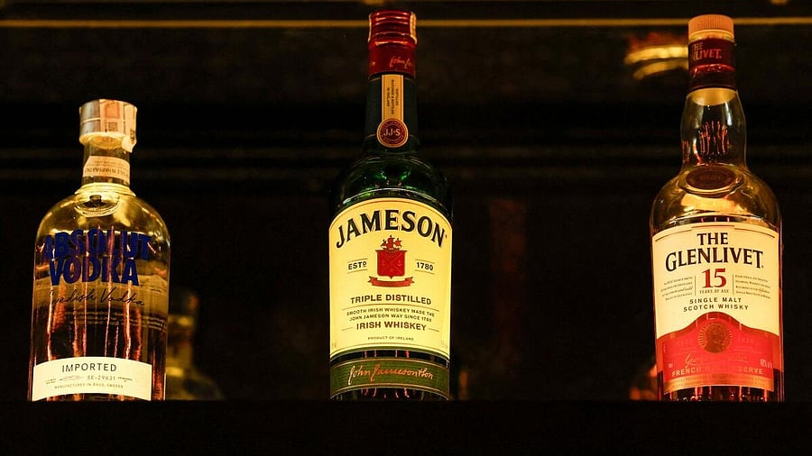 <div class="paragraphs"><p>Bottles of Pernod Ricard's brands are displayed at a bar</p></div>