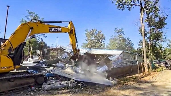 <div class="paragraphs"><p> The land of contractor and main accused in the murder of journalist Mukesh Chandrakar being bulldozed, in Bijapur district, Chhattisgarh, Saturday, Jan. 4, 2025. Three persons were arrested on Saturday in connection with the murder of journalist Mukesh Chandrakar in Chhattisgarh's Bijapur district, while Deputy Chief Minister Vijay Sharma announced the setting up of a Special Investigation Team to probe the case.</p></div>