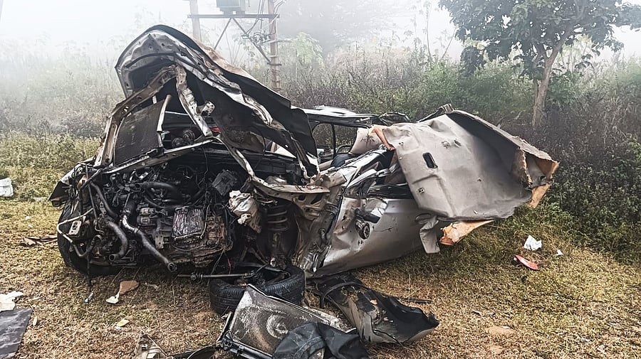<div class="paragraphs"><p>A mangled car that's beyond recognition after it hit a lorry killing two on the outskirts of Koratagere on Monday.</p></div>