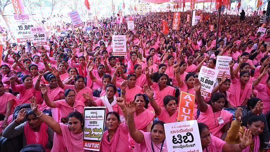 <div class="paragraphs"><p>Asha Workers in Karnataka sit on a protest at Freedom Park.</p></div>