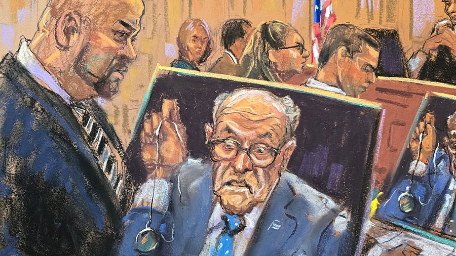 <div class="paragraphs"><p>Rudy Giuliani holds up a watch that he has not yet turned over while appearing remotely by video link as his attorney Joseph Cammarata questions him, during a hearing before US District Judge Lewis Liman in his case over the handover of property to two Georgia election workers he was found to have defamed, in New York City, US.</p></div>