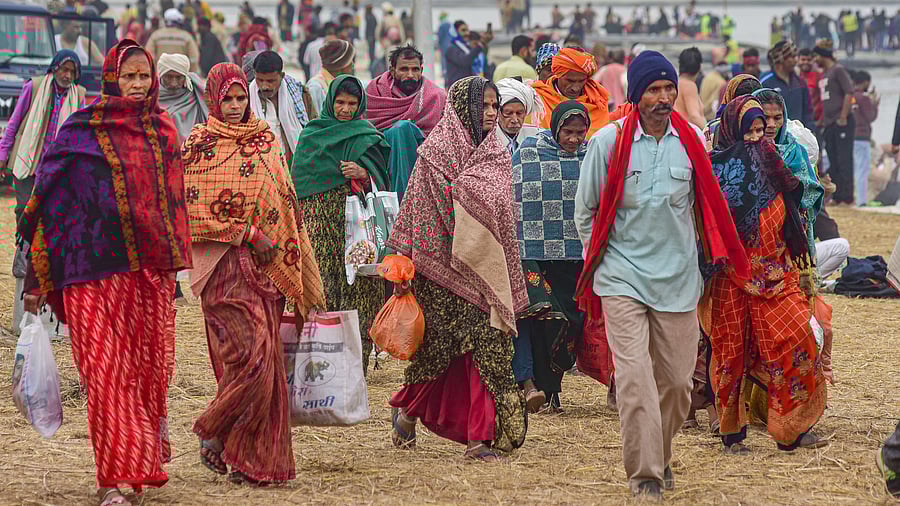 <div class="paragraphs"><p>Devotees after taking a holy dip in the Ganga river during a cold winter morning, ahead of Maha Kumbh Mela 2025, at Sangam, in Prayagraj, Tuesday, Dec. 31, 2024</p></div>