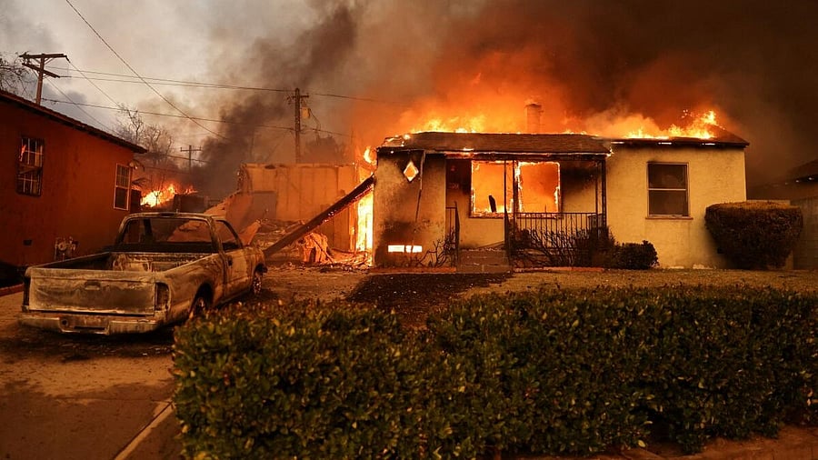 <div class="paragraphs"><p>A house burns as powerful winds fueling devastating wildfires in the Los Angeles area force people to evacuate, at the Eaton Fire in Altadena, California, U.S. January 8, 2025.</p></div>