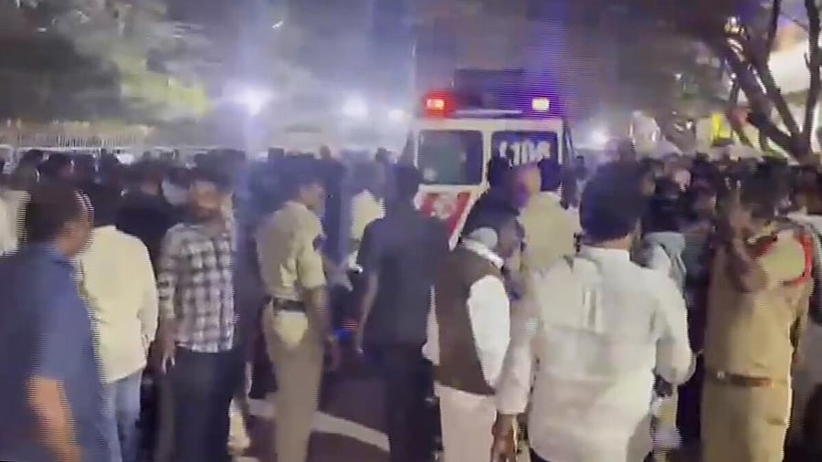 <div class="paragraphs"><p>Police personnel and people gather after a stampede broke out as hundreds of devotees jostled for tickets for Vaikunta Dwara Darshanam at Lord Venkateswara Swamy temple on Tirumala Hills, in Tirupati, Andhra Pradesh, Wednesday, Jan. 8, 2025. At least four devotees, including three women, died and several more were injured in the incident, according to officials.</p></div>