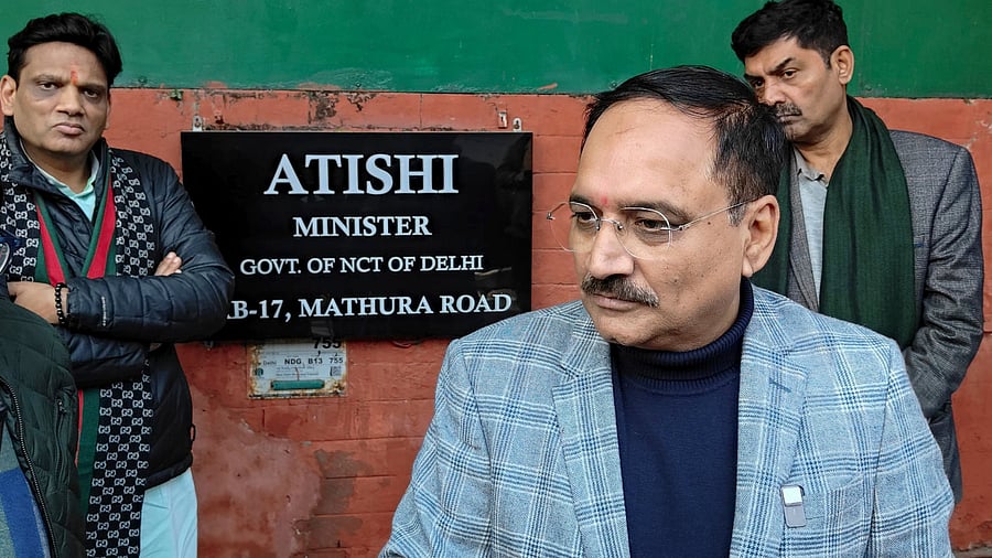 <div class="paragraphs"><p>New Delhi: Delhi BJP President Virendra Sachdeva arrives at Delhi Chief Minister Atishi's official residence, in New Delhi, Wednesday, Jan. 8, 2025. </p></div>