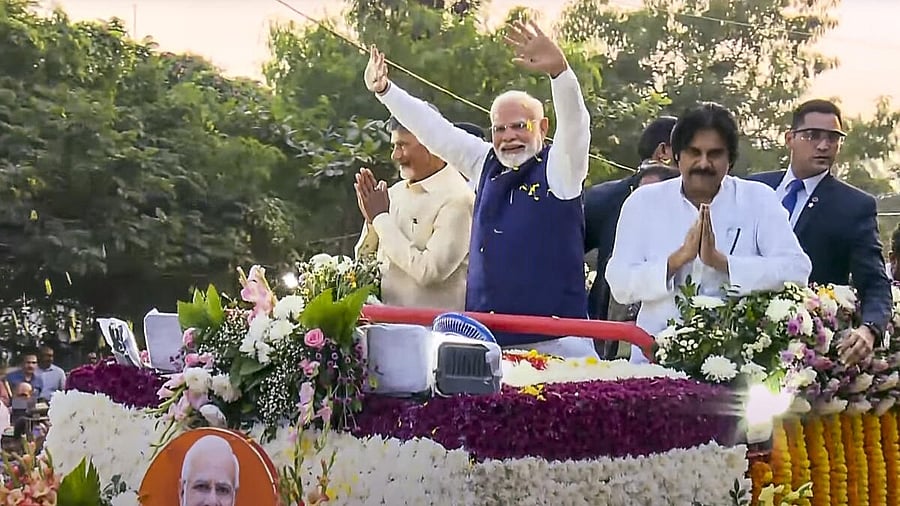 <div class="paragraphs"><p>PM Narendra Modi with Andhra Pradesh CM Chandrababu Naidu and his deputy Pawan Kalyan during a roadshow, in Visakhapatnam. </p></div>