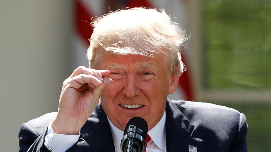 <div class="paragraphs"><p>US President Trump refers to temperature change as he announces decision to withdraw from Paris Climate Agreement at White House in Washington.  </p></div>