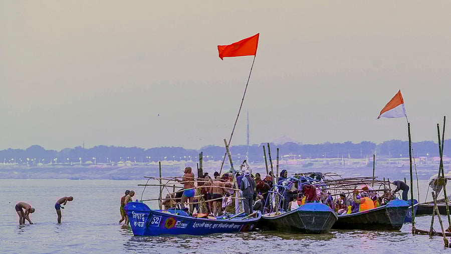 <div class="paragraphs"><p> Devotees take a holy dip in Sangam, the confluence of the Ganga, Yamuna and the Saraswati rivers, on a winter morning, ahead of the Maha Kumbh Mela festival, in Prayagraj.</p></div>