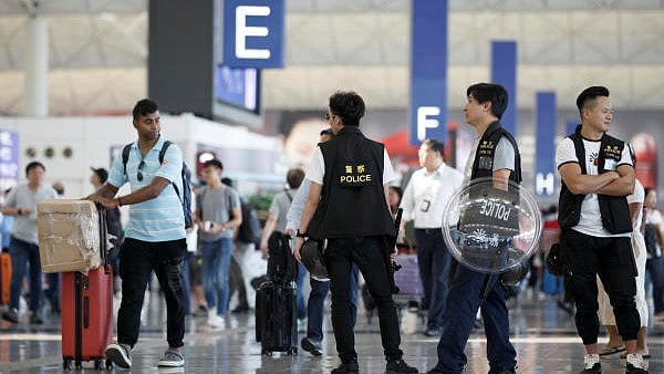 <div class="paragraphs"><p>departure hall of the airport in Hong Kong.</p></div>