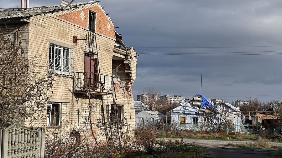 <div class="paragraphs"><p>A view shows houses and apartment buildings damaged by Russian military strikes, amid Russia's attack on Ukraine, in the frontline town of Orikhiv in Zaporizhzhia region</p></div>