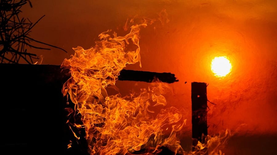 <div class="paragraphs"><p>Flames rise from a beachfront home along the road to Malibu, as powerful winds fueling devastating wildfires in the Los Angeles area force people to evacuate, California, US.</p></div>