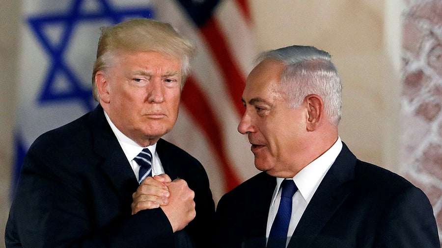 <div class="paragraphs"><p>Then US President Donald Trump and Israeli Prime Minister Benjamin Netanyahu shake hands after Trump's address at the Israel Museum in Jerusalem May 23, 2017.</p></div>
