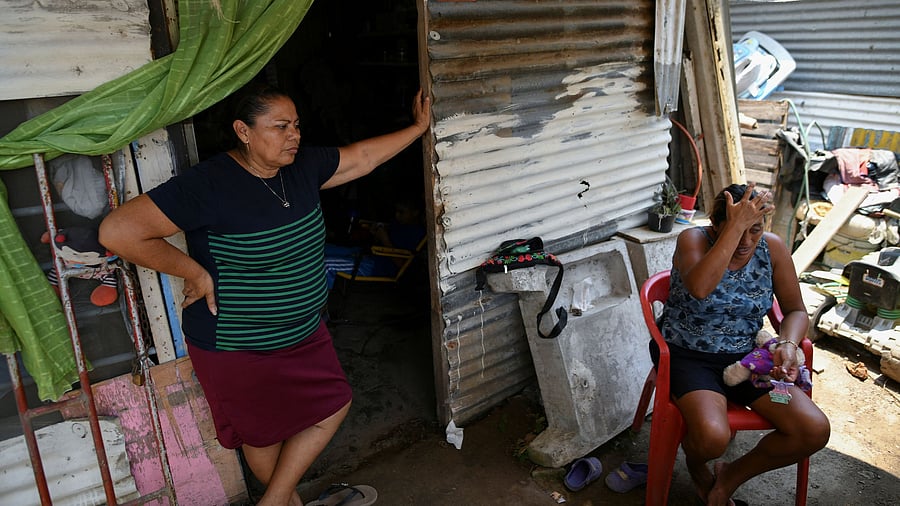 <div class="paragraphs"><p>Women take shelter from the sun in their house on a hot spring day amid a nationwide drought and heat waves that have sent temperatures soaring across much of the country, in Veracruz, Mexico.</p></div>