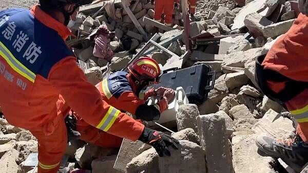 <div class="paragraphs"><p>Rescue teams work amidst rubble in the aftermath of an earthquake in a location given as Shigatse City, Tibet Autonomous Region, China, in this screengrab obtained from a handout video released on January 7, 2025. </p></div>