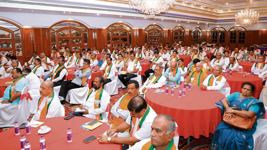 Many prominent BJP leaders, including former MLAs, participate in a lunch hosted by party state president B Y Vijayendra in Bengaluru on Friday.