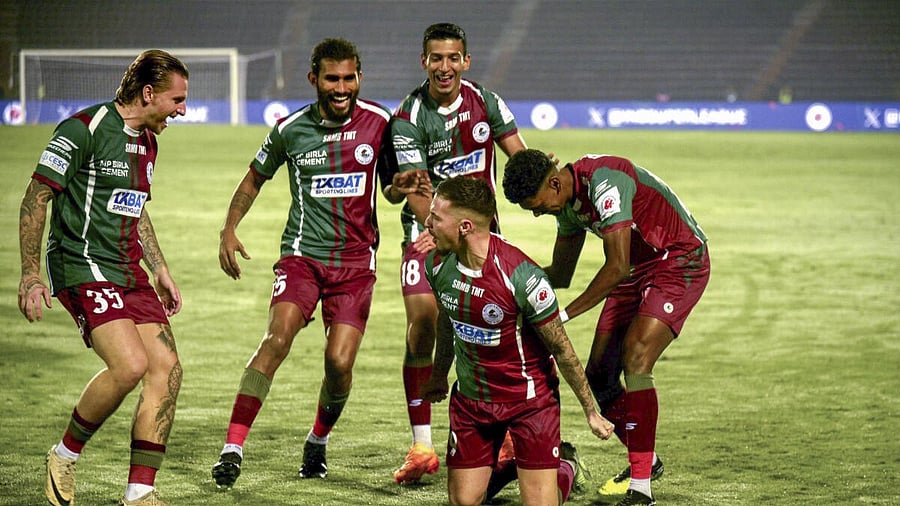 <div class="paragraphs"><p>Mohun Bagan Super Giant player Jamie Maclaren with teammates celebrate after scoring a goal against East Bengal FC during the 11th season of Indian Super League, at Indira Gandhi Athletics Stadium in Guwahati.&nbsp;</p></div>