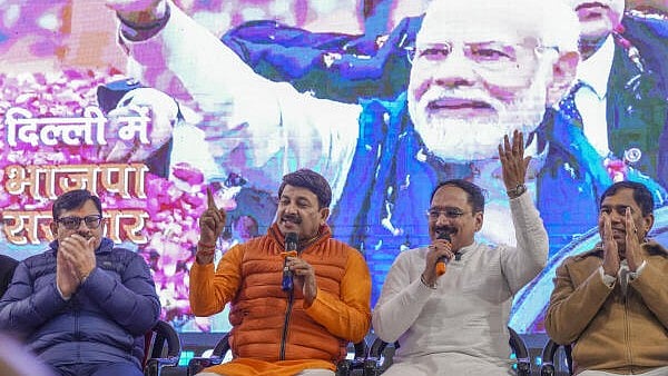 <div class="paragraphs"><p>BJP MP Manoj Tiwari, second left, the party’s Delhi President Virender Sachdeva, second right, party leader Yogender Chandolia, right, and others during the launch of their campaign song for the upcoming Delhi Assembly elections, in New Delhi, Saturday.&nbsp;</p></div>