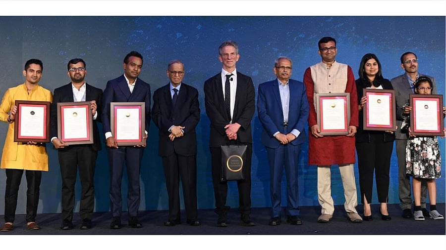 <div class="paragraphs"><p>caption: (From left) Winners, Arun G Chandrasekhar, Professor of Economics, Stanford University, USA, Prof Mahmood Kooria, Lecturer, School of History, Classics and Archaeology, University of Edinburgh, UK, Prof Shyam Gollakota, Paul G Allen School of Computer Science and Engineering University of Washington, Infosys founder &amp; Trustee of Infosys Science Foundation N R Narayana Murthy, Mathematician Peter Sarnak, Trustee Kris Gopalakrishnan, Prof Siddhesh Kamat Associate Professor in the Department of Biology at IISER, Pune, Prof Vedika Khemani, Associate Professor at Stanford University, USA ,and husband and daughter of Neena Gupta, Professor, Theoretical Statistics and Mathematics Unit, Indian Statistical Institute, Kolkata during the 16th Infosys prize organised by Infosys Science Foundation in Bengaluru on Saturday, 11th January 2025. </p></div>