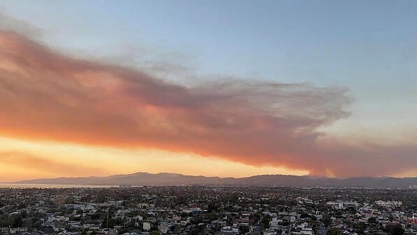 <div class="paragraphs"><p>Smoke rises from a wildfire in Los Angeles, California, US.</p></div>