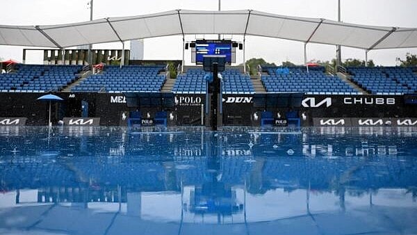 <div class="paragraphs"><p>View of an empty outside court at the Australian Open in Melbourne as play is suspended due to rain.</p></div>