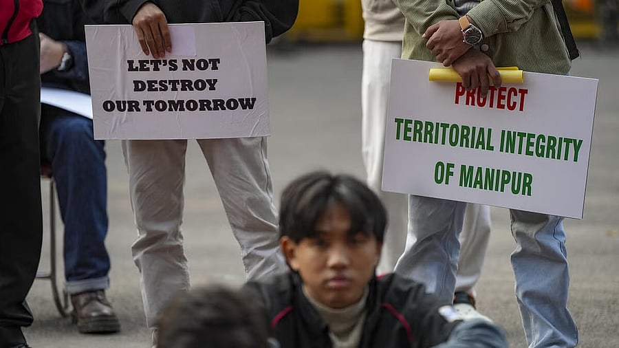 <div class="paragraphs"><p>File photo of supporters taking part in a protest over the Manipur violence issue</p></div>