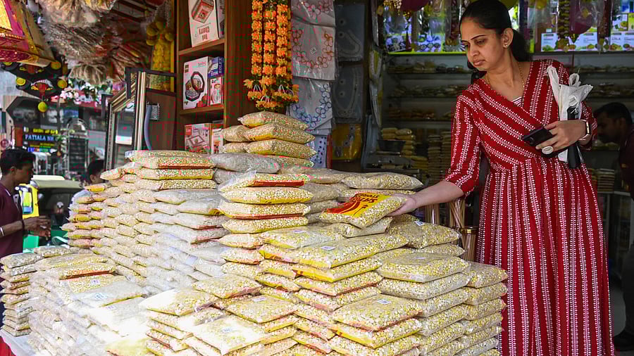 <div class="paragraphs"><p>People purchase yellu-bella at Gandhi Bazaar, as they gear up for Sankranti on Tuesday.&nbsp;</p></div>