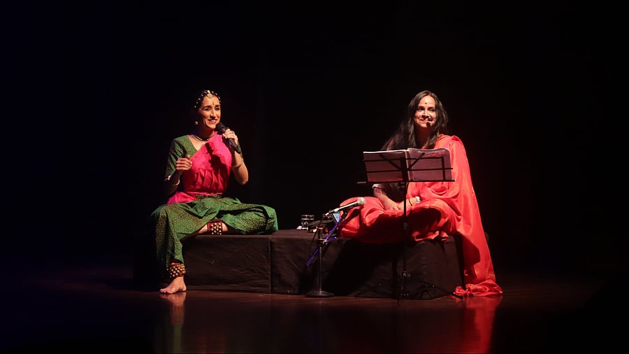 The artistes have a moment on stage.