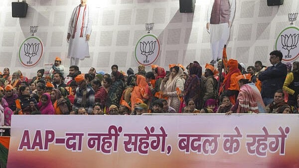 <div class="paragraphs"><p>BJP workers during the 'Jhuggi Pradhan Sammelan' addressed by Union Home Minister Amit Shah.</p></div>