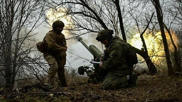 <div class="paragraphs"><p>Servicemen of artillery crew of the special unit National Police fire a D-30 howitzer towards Russian troops at a position in a front line, amid Russia's attack on Ukraine, in Zaporizhzhia region, Ukraine.</p></div>