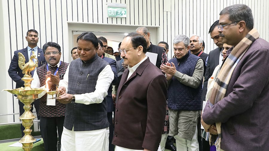 <div class="paragraphs"><p>Odisha chief minister Mohan Charan Majhi lights the lamp as Union health and family welfare minister Jagat Prakash Nadda,  and other dignitaries watch on during the inauguration of&nbsp; Ayushman Bharat scheme.&nbsp;</p></div>