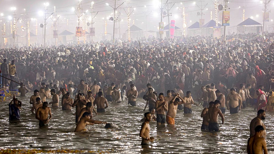 <div class="paragraphs"><p>Devotees take ‘Amrit Snan’ on Makar Sankranti in Prayagraj, Uttar Pradesh.</p></div>