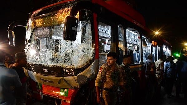 <div class="paragraphs"><p>Security personnel near the damaged Brihanmumbai Electric Supply and Transport (BEST) undertaking's bus after it rammed into pedestrians</p></div>