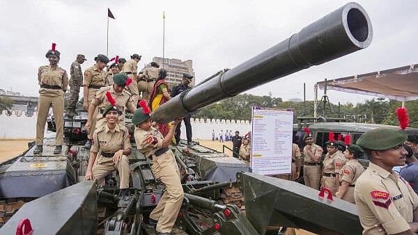 <div class="paragraphs"><p>National Cadet Corps (NCC) personnel during a weapons and equipment exhibition ‘Know Your Army’ ahead the upcoming 77th Indian Army Day.</p></div>