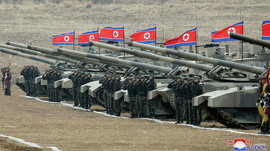 <div class="paragraphs"><p> Military members salute during a military demonstration involving tank units, guided by North Korean leader Kim Jong Un , in North Korea. KOREA./File Photo</p></div>
