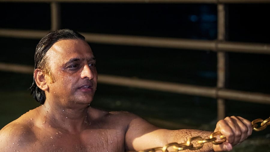 <div class="paragraphs"><p>Samajwadi Party Chief Akhilesh Yadav takes a dip in the River Ganga.</p></div>