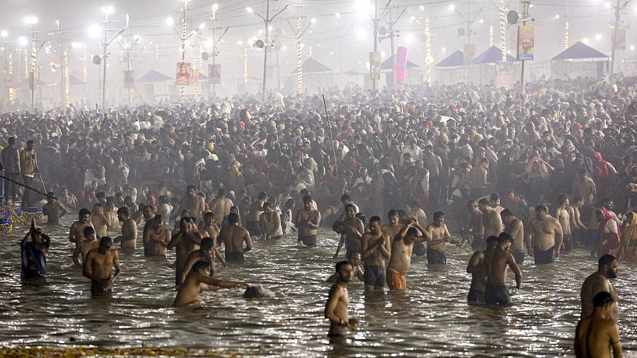 <div class="paragraphs"><p>Devotees take a holy dip at Sangam on the first day of Maha Kumbh Mela 2025, in Prayagraj. </p></div>