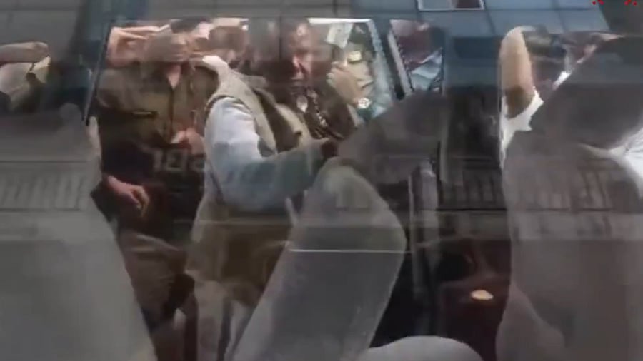 <div class="paragraphs"><p>Screengrab from a video showing Congress MLA Kawasi Lakhma being escorted by ED after being arrested.</p></div>