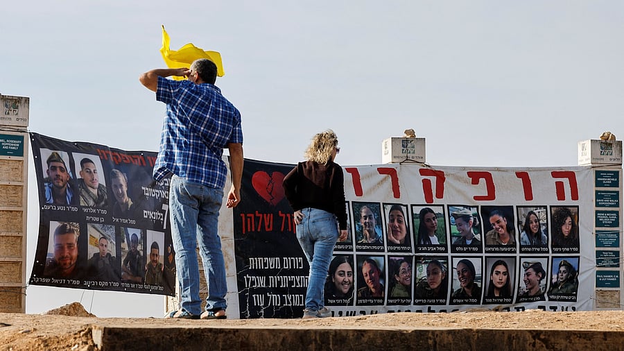 <div class="paragraphs"><p>Israelis visit a memorial site for soldiers who were killed on October 7, 2023 near the border with North Gaza, ahead of a ceasefire between Israel and Hamas</p></div>